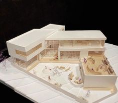 an architectural model of a house on display