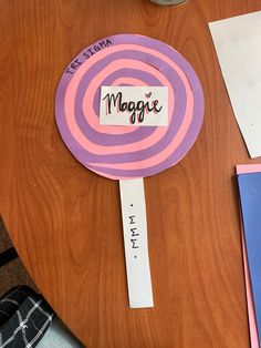 a lollipop sitting on top of a wooden table