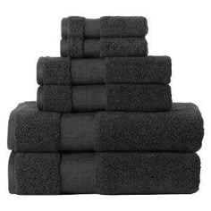 black towels stacked on top of each other