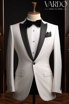 a white tuxedo jacket with black lapel and bow tie