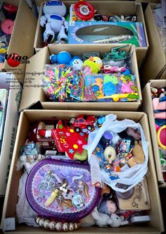 two boxes filled with toys and other items