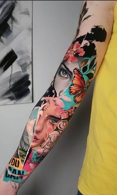 a woman's arm with tattoos and flowers on it in front of a painting