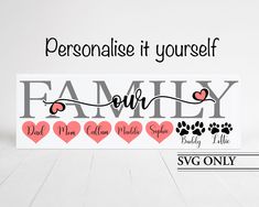 a family sign with hearts and paw prints on the front, in black and pink