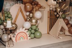 an assortment of balloons and decorations on display