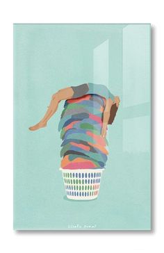 a man is hanging upside down in a laundry basket