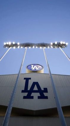 the los angeles dodgers stadium is lit up at night