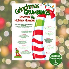 the christmas grumpings poster is hanging from a tree with lights in the background