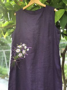 ❤ The linen hand embroidered dress is very soft, skin friendly, breezy and comfortable.  ❤ Item description: - A lovely dress with embroidered daisy and lavender bouquet motifs. - Material: linen, coconut button, embroidery threads. - Environmentally friendly. - This dress is very useful, go with any outfit, that can be used to go to school, go out, go shopping.    It is a perfect gift for yourself or your beloved.  ❤ Care instructions:      The best way to wash embroidery cloth is to put it in soapy water (with a mild detergent and cold water at 86 ºF/30oС) for 20 minutes. Try to not wash the item with other clothing that might cause damage, such as zippers, buttons or different colors. You wash it by hand, and if you have dirty patches on your garment, you can gently rub them, it's best Linen Dress Embroidery, Embroidery On Purple Fabric, Luxury Linen Dresses With Floral Embroidery, Embroidery On Dress, Purple Embroidered Dress For Summer, Embroidered A-line Summer Dress, Hand Embroidered Dress, Sleeveless Linen Dress With Floral Embroidery, Spring Purple Embroidered Dress With Floral Detail