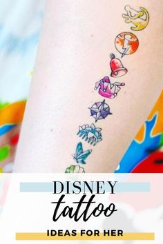 the disney tattoo is on someone's leg and it looks like they are getting tattoos