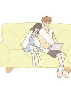 a man and woman sitting on a couch with a laptop computer next to each other