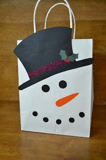 a paper bag with a snowman on it