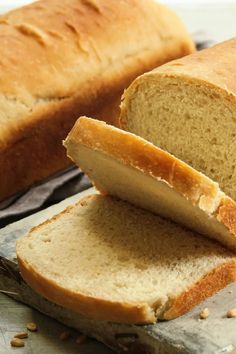 a loaf of bread sitting on top of a cutting board