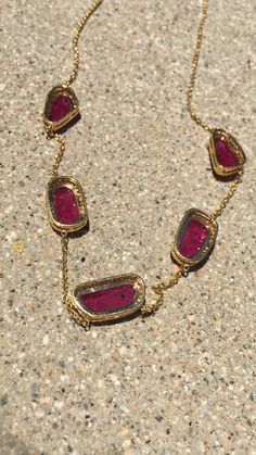 Unique Ruby diamond chain necklace Gross Weight 9 gms 18k Gold Diamond .74 carats Natural Cut heat treated Ruby 7 carats Beautiful Ruby Chain necklace with 5 Natural Cut Ruby Bezel set with diamonds around them. This necklace is great to wear by itself or layered. The Shape of Ruby Stonesz might be different. The Length and stones can be customized. You can order in Emerald, Tanzanite, Citrine, Amethyst or Topaz. Yellow Gold Ruby Jewelry, Fine Jewelry Ruby Necklace With Single Cut Diamonds, Ruby Necklace With Single Cut Diamonds, Dazzling Yellow Gold Jewelry With Stones, Faceted Round Diamond Necklace, Luxury Faceted 14k Gold Necklaces, Yellow Gold Pendant Jewelry With Jewels, Luxury 14k Gold Faceted Necklaces, Fine Jewelry In 14k Gold With Stones