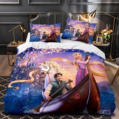 the bed is decorated with disney's princess aurora and prince rapp on it