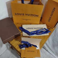 This Bundle Contains 2 Boxes, 1 Gift Bag, 1 Wallet Duster Bag And A Gift Card Holder With 2 Lv Ribbons. There Is Some Small Staining On The Bottom Of The Gift Bag, The Orange Box Has A Ripped Corner And There Are A Couple Of Small Scuffs On The Top Of The Brown Box. From A Smoke Free Home. Measurements Included In Pictures. Louis Vuitton Gift, Louis Vuitton Gifts, Louis Vuitton Paris, Orange Box, Orange Boxes, Brown Box, Gift Card Holder, Louis Vuitton Bags, Gift Tag