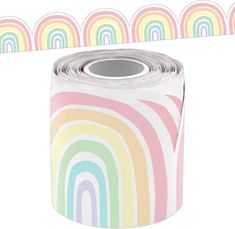 a roll of toilet paper with rainbows on it and a sticker next to it