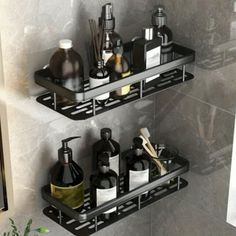 two metal shelves holding bottles and other bathroom items