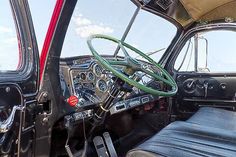 the interior of an old car with leather seats