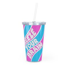 a blue and pink tumbler with the words free your brain on it