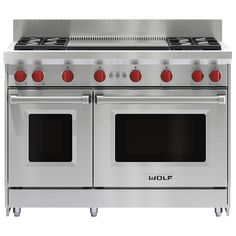 two ovens side by side with red knobs on the top and bottom doors