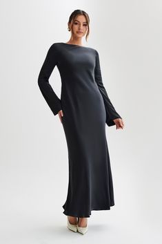 For the best dressed guest. Step into refined elegance with the RAYLEIGH Long Sleeve Satin Maxi Dress, a luxurious ensemble tailored for sophistication and grace. Featuring long sleeves that exude timeless charm, this dress boasts a keyhole and button closure at the back neckline, adding a touch of allure to its design. With a slip-on design and no closure, it ensures effortless wear, while the lining offers comfort and coverage. Complete with a maxi length, the Rayleigh dress is perfect for mak Long Sleeve Slip Dress, Dresses Date Night, Long Slip Dress, Date Night Dresses, Beige Dresses, Satin Maxi, Black Wedding Dresses, Satin Maxi Dress, Best Dressed