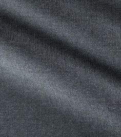 dark blue fabric textured with white stitching