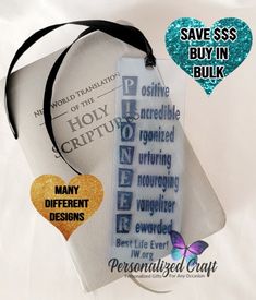 a white bookmark with words on it and a black ribbon around the neck that says, save less buy in bulk