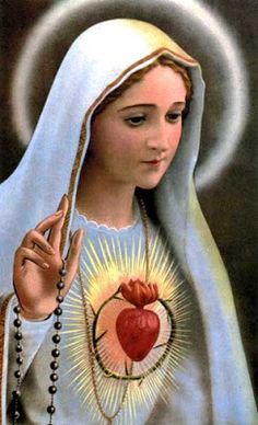 the virgin mary holding an apple in her hand