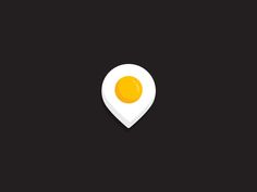 an egg is shown in the shape of a map pointer on a black background with a shadow