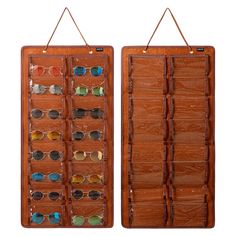 two wooden display cases with sunglasses hanging from the top and bottom, each containing several pairs of glasses