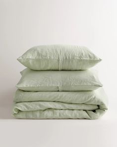 three pillows stacked on top of each other