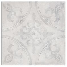 a white tile with an intricate design on the bottom and sides, in shades of gray