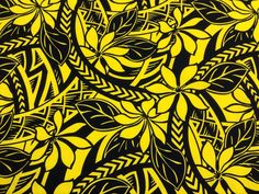 a yellow and black pattern with leaves on it