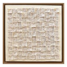 a white and brown painting with squares on it