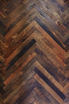 an image of wood flooring that looks like herringbones