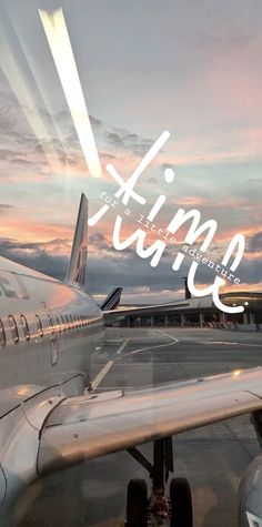 an airplane sitting on the tarmac at sunset with the word king written in front of it