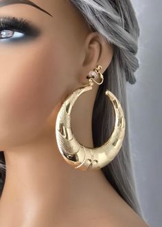 1 pair of big chunky C style hoop earrings - large chunky puffed up style patterned hoops for non pierced ears,  Available as a clip on for non pierced ears, these have a 18k gold plated screw / pull back style clip for non pierced ears Do check the video on how they work as clip on Measure 3.25" diameter & each earring weighs 15g Important please read carefully - I have a 3 - 5 day dispatch time to make up my orders as I work alone but these are all calculated in your estimated delivery time which is shown to you on the listing so please check this, I can't help overseas shipping times as these are set by the postal service and I am in the UK.  Postal delays caused by customs is not something I can predict or avoid so do please allow a little extra time for this,  You are more than welcom Clip On Hoop Earrings, Hoop Earrings Big, Earrings Big, Earrings Large, Large Hoop Earrings, Earrings 3, Big Earrings, Postal Service, Pierced Ears