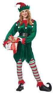 a woman dressed in an elf costume and holding a christmas present while standing with her hands on her hips