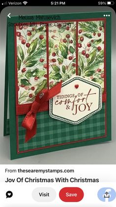 a christmas card with holly and berries on it