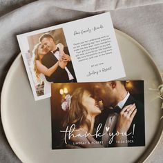 a wedding thank card on top of a plate