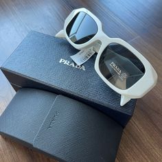 49mm Lens Width; 20mm Bridge Width; 145mm Temple Length 100% Uv Protection Acetate Made In Italy Item # 6256123 Prada Fashion, Sunglasses Logo, Prada Accessories, White Sunglasses, Prada Eyewear, Brown Sunglasses, Butterfly Sunglasses, Havana Brown, Prada Sunglasses