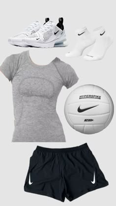 a women's nike shirt, shorts and sneakers