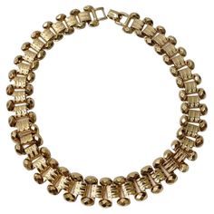 Get your hands on this incredible 1980s 18K gold plated choker style necklace! The most unique arrangement of mid century style gold plating comes together to create this gorgeous and eye catching necklace. This is the perfect necklace to throw on when you are running out the door as it will pair well with just about anything in your wardrobe. Style this with a Bottega Veneta sweater and a Pucci maxi skirt for the ultimate laid back chic look. In excellent vintage condition, please see photos. Layered Necklaces Outfit, Pucci Vintage, Necklace Outfit, Choker Style Necklace, Choker Style, Chic Look, Style Necklace, Mid Century Style, Look Chic