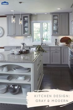 a kitchen with gray cabinets and white counter tops is featured in the love's com website