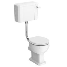 a white toilet sitting on top of a white floor