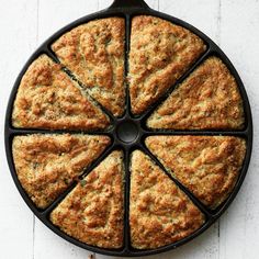 a cake that has been cut into eight slices and is sitting on a white table