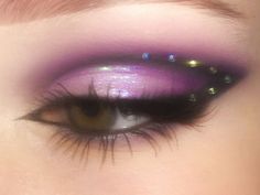 Purple Makeup Looks Euphoria, Purple Glitter Hair, Purple Makeup Eyeshadow, Lavender Makeup Aesthetic, Space Makeup Aesthetic, Iridescent Makeup Looks Prom, Purple Makeup Looks With Rhinestones, Purple Star Makeup, Euphoria Purple Makeup