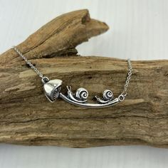 Artistic and exquisite, this vintage style Snail Mushroom Necklace has quickly become a natural favorite this season. Treat yourself or someone you love to this fun, woodland piece. Makes a wonderful gift for nature lovers. ﻿Details: Eco-friendly Alloy with Antique Silver Finish Pendant Size: 1 5/8" long Cable Chain: Stainless Steel, 18''+2'' Extension Snail Jewellery, Snail Pendant, Snail Mushroom, Silversmithing Jewelry, Silver Metal Clay, Mushroom Necklace, Mushroom Jewelry, Laser Ideas, Art Jewelry Design