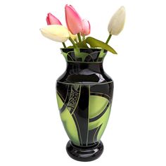 a black vase filled with pink and white flowers