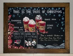 this is the taste of christmas written on a blackboard with coffee and whipped cream